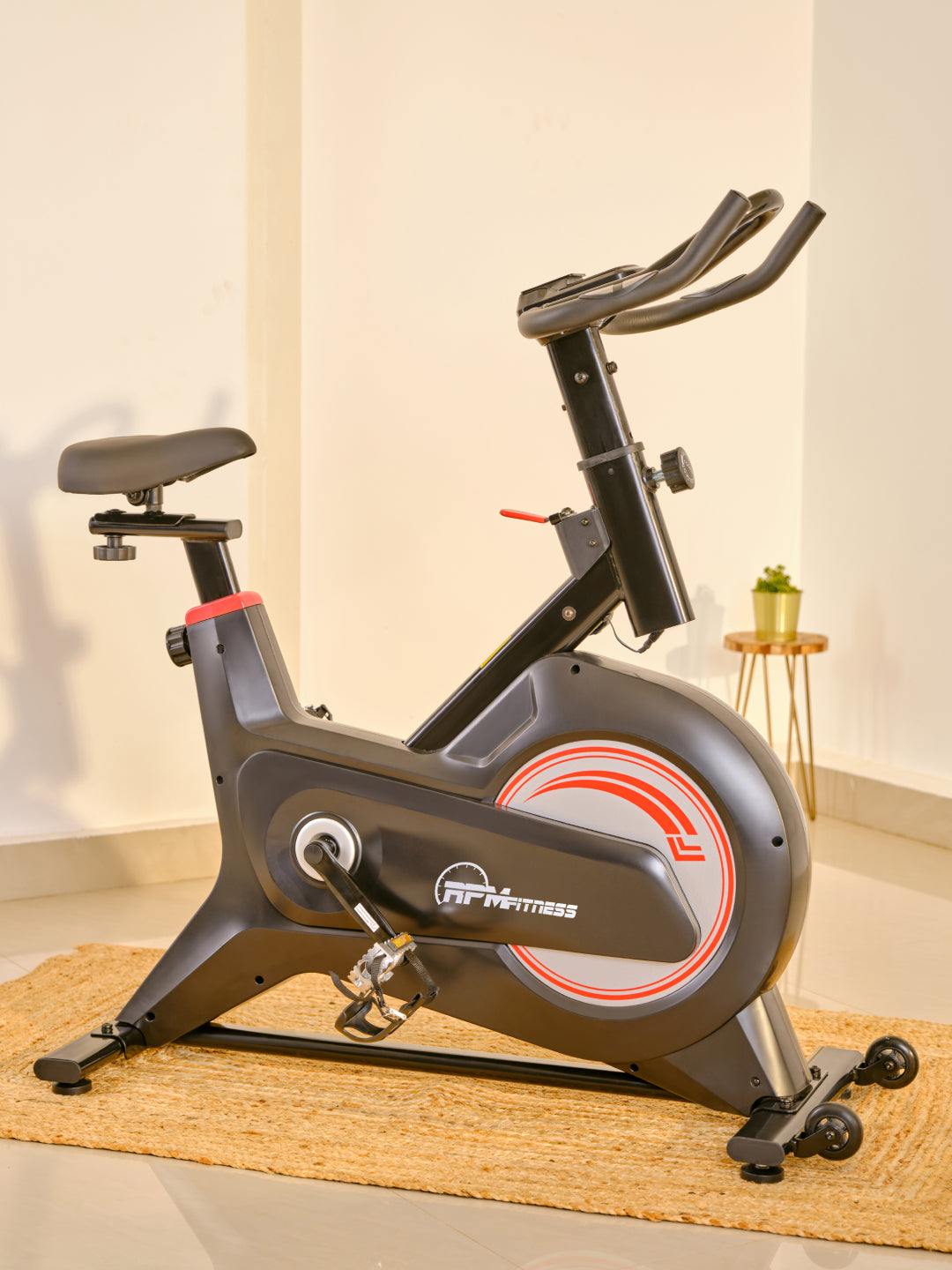 RPM600 NoiseFree Spinbike | 6kg Flywheel | Max Weight 110kg | 8 Level Magnetic Resistance | Black & White (with 6 months extended warranty)